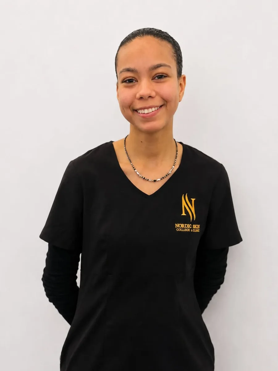 Jasmin, cosmetology student at Nordic Skin College at Kongens Nytorv, in the school uniform